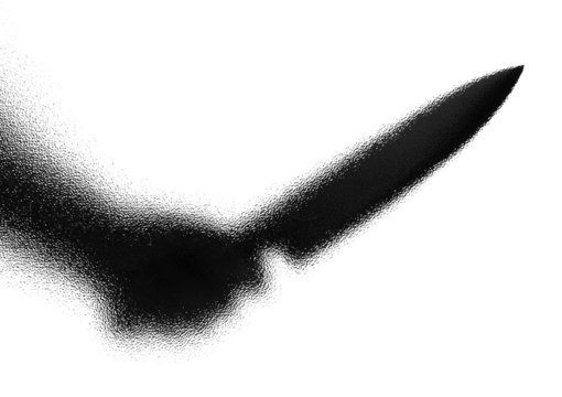 Knife in a hand. Silhouette. Photographed through the textured g