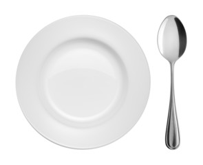 Plate and spoon on white background
