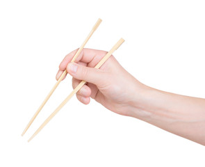 chopsticks in hand on a white background
