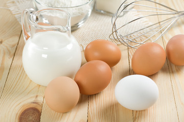Basic ingredients for dough. Milk, eggs and flour.