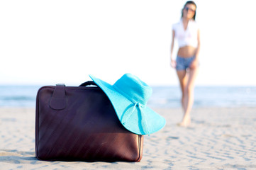 Brown Travel Vacation Suitcase on Beach