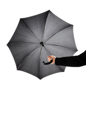 Hand keeps umbrella