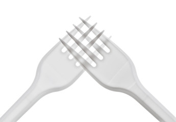 intersecting plastic forks on a white background