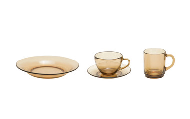 Glass plates and cups on a white background