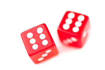 Two red dices in motion