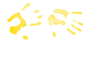 Two yellow handprints