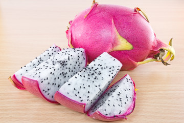 Dragon fruit on wooden cutting board