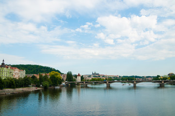 Beautiful Prague bridges and quays - view from the river Vltava