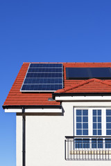 House roof covered with solar panels
