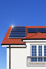 House roof covered with solar panels