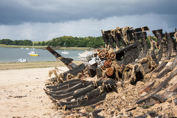 Burned ship wreck at coast of Brittany, France
