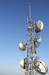 Telecommunication tower with parabolic receiver