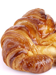Big & delicious croissant isolated on white background