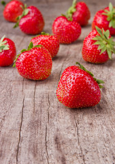 Fresh strawberries on wooden table