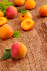 Fresh apricots on wooden table