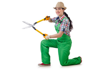 Girl with garden scissors on white