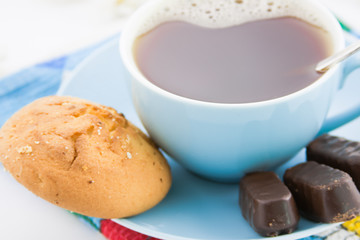 cup of hot coffee on a napkin