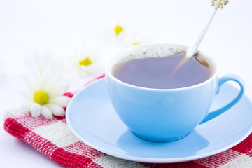 cup of hot coffee on a napkin