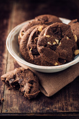 Chocolate and hazelnuts cookies in a bowl
