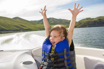 Travel of children on water in the boat