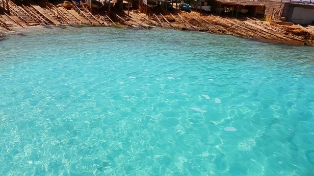 beautiful rocky escalo beach in balearic islands