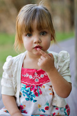 Cute toddler portrait in outdoor park