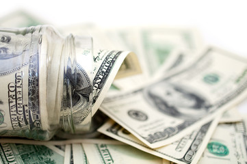 dollars in money jar
