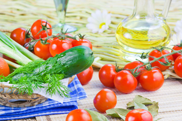 ripe red tomatoes and fresh greenery