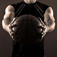 Basketball Player holding a Ball