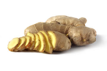 ginger with a few slices on white background