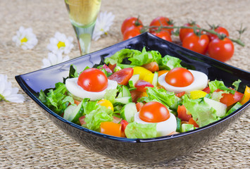 lettuce from vegetables with fresh greenery  in a decorative dis