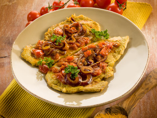 escalope with curry onions and tomatoes