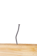 Wooden board with nails