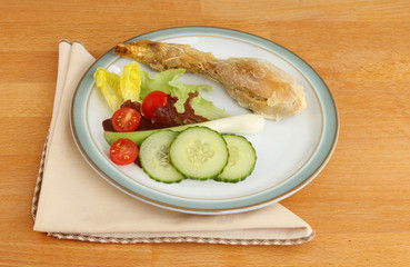 Chicken salad with napkin