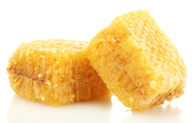 golden honeycombs isolated on white.