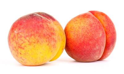 ripe peaches isolated on white.
