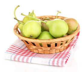 ripe pears in basket isolated on white.