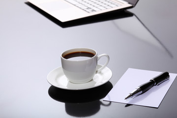 Obraz na płótnie Canvas Coffee at business workplace