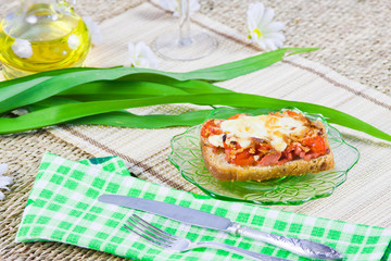 hot open sandwich with sausage and vegetables