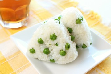 Japanese cuisine rice ball Onigiri with green-peas