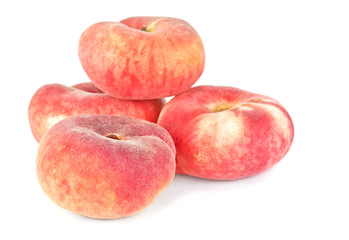Chinese flat peaches isolated on  white