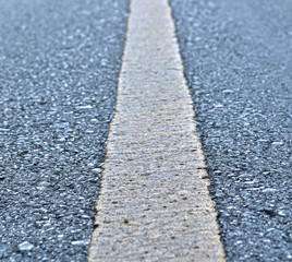 Obraz premium Asphalt road texture with yellow stripe