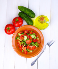 Fresh salad with tomatoes and cucumbers