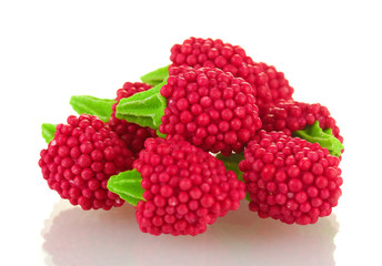 red candy raspberries isolated on white