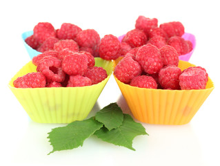 Fresh raspberries in silicone molds isolated on white