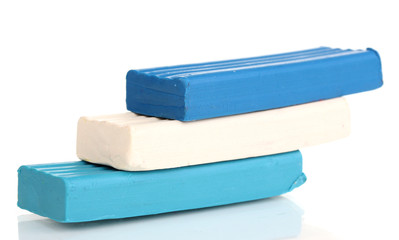 Children bright plasticine isolated on white