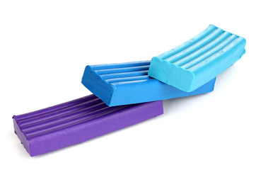 Children bright plasticine isolated on white