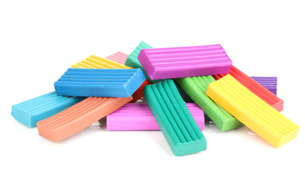 Children bright plasticine isolated on white