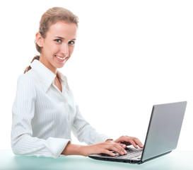 friendly administrative assistant at the desk with a laptop