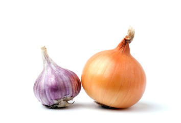 Garlic and onion bulbs on white background